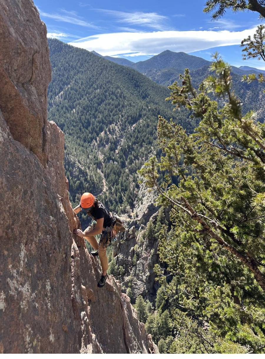 Scott West trad climbing on a granite face above the Boulder foothills