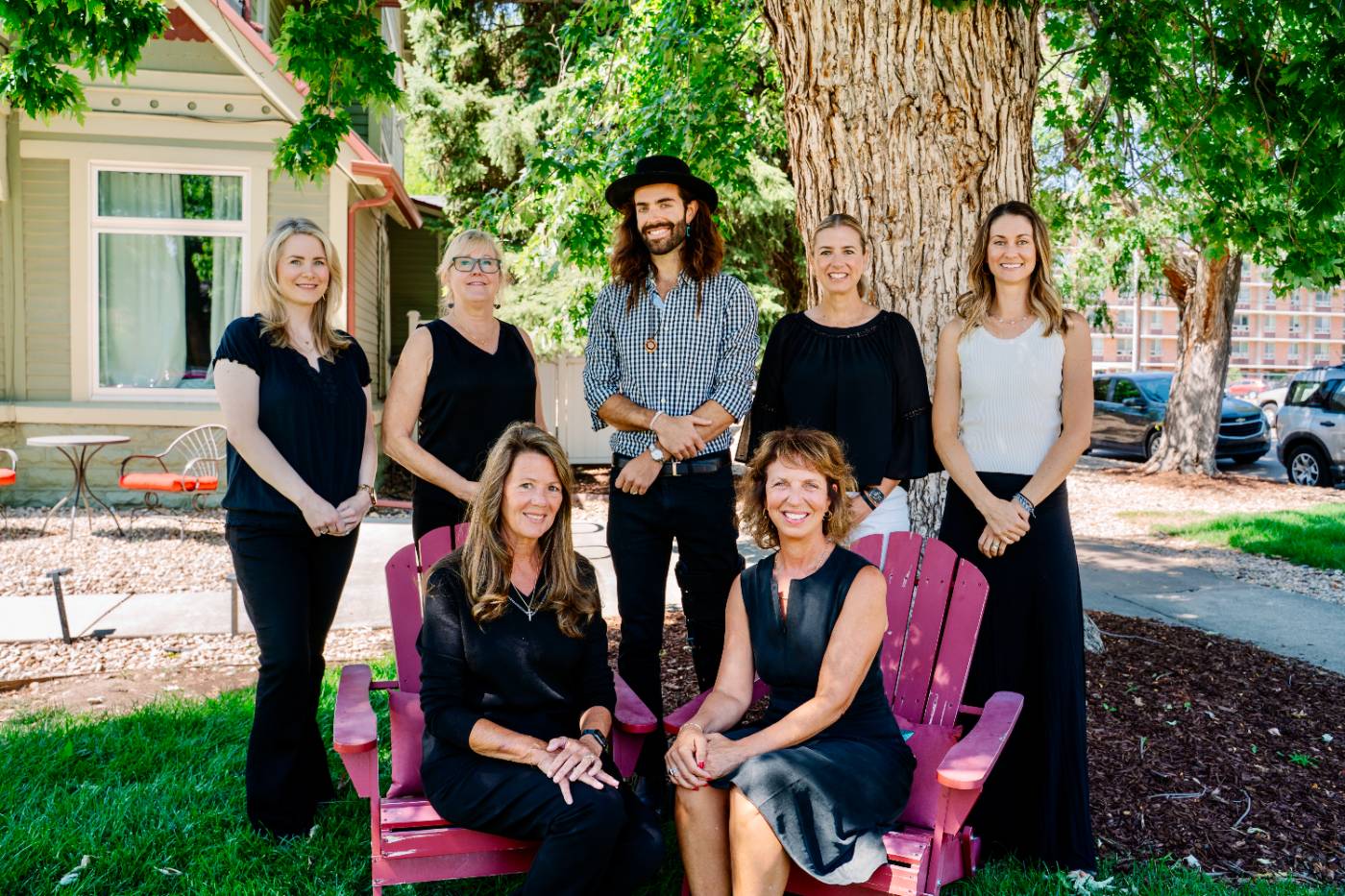 The Front Range Collective team gathered under a tree in Boulder